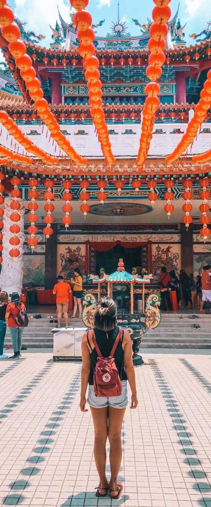 woman at colorful temple
