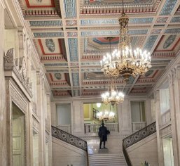 ornate building interior with chandeliers