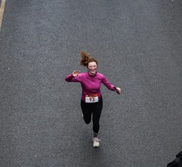 woman running on street