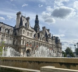 ornate palatial building with fountains