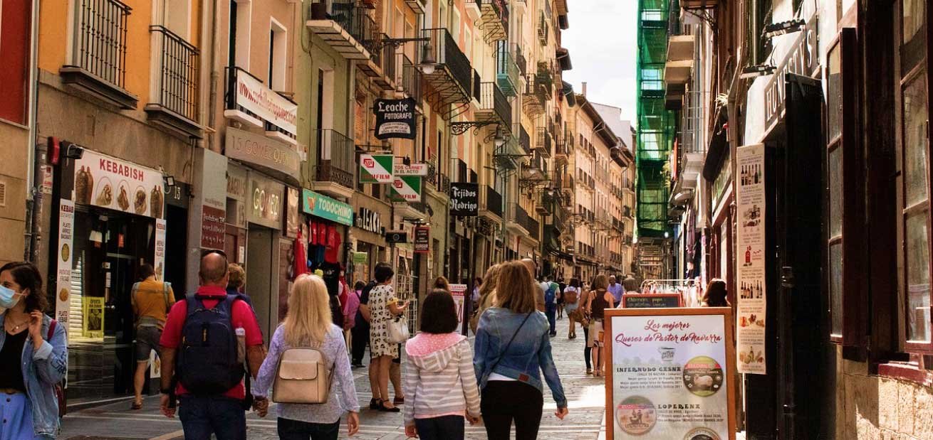 people walking along old city streets